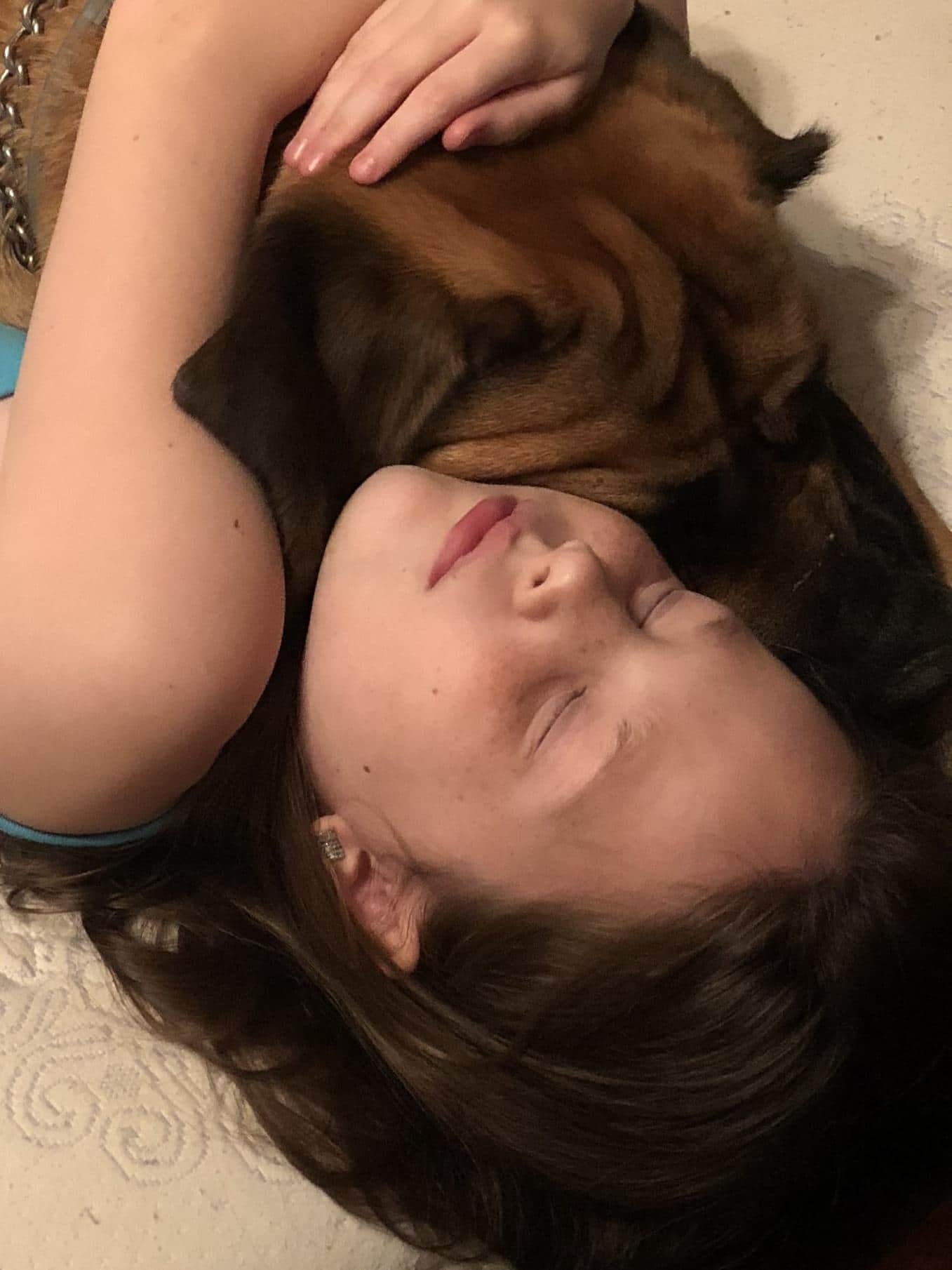 mastiff sleeping with small girl