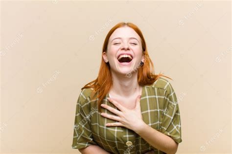 Woman laughing at humorous dog videos