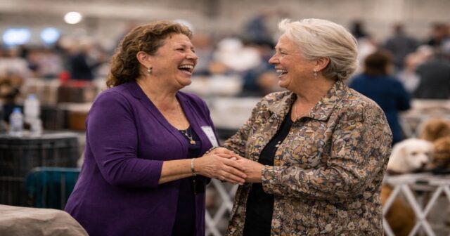 dog-show-characters-feature-1200x630 Dog show characters greeting each other at a dog show event