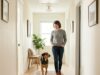 Why Some Dogs Become Velcro Dogs Velcro dog calmly following its owner through a bright hallway
